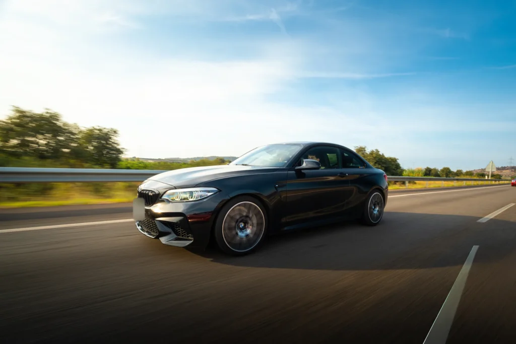 BMW M4 negro rodando en la ruta RX04 Villahermosa de Road Experience, ruta en coche deportivo por Castellón